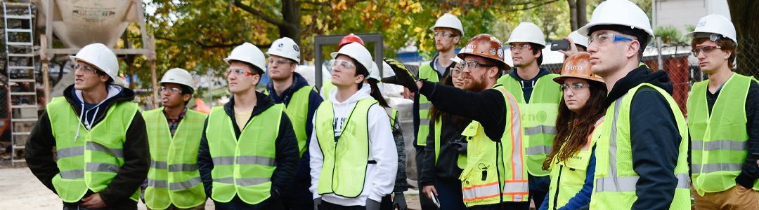 multiple students standing together wearing personal protective equipment